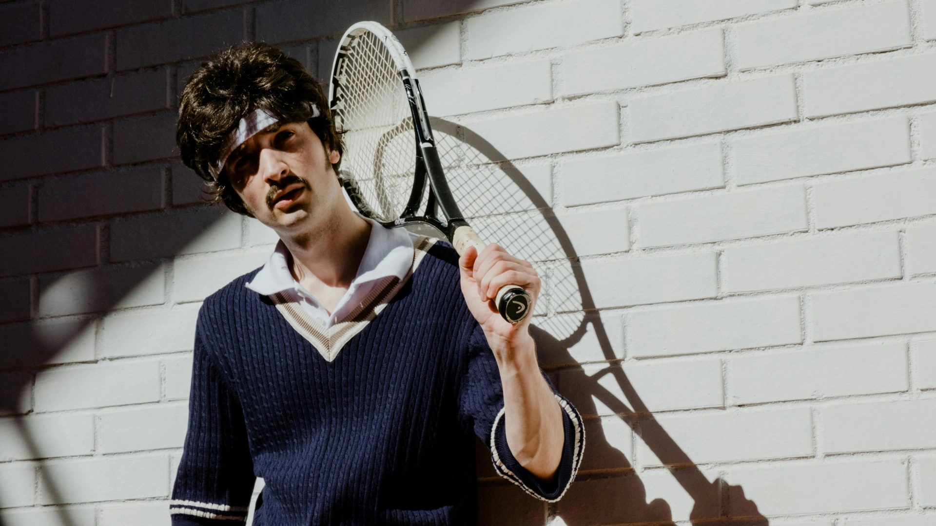 Man holding a tennis racket